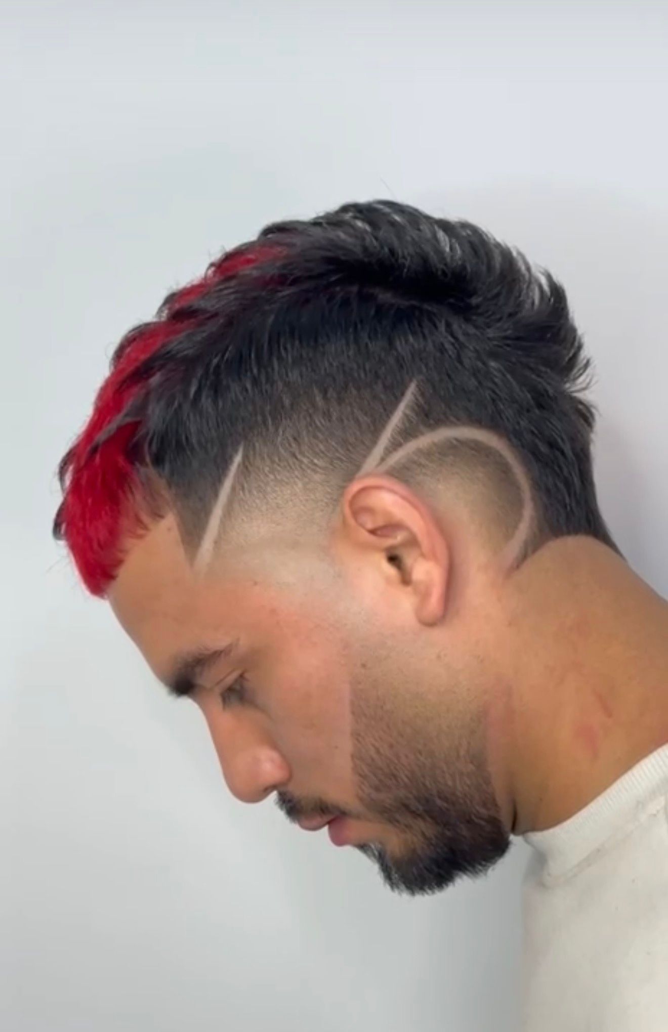 Creative hair design by Alex Urbaez Barber Gainesville Florida